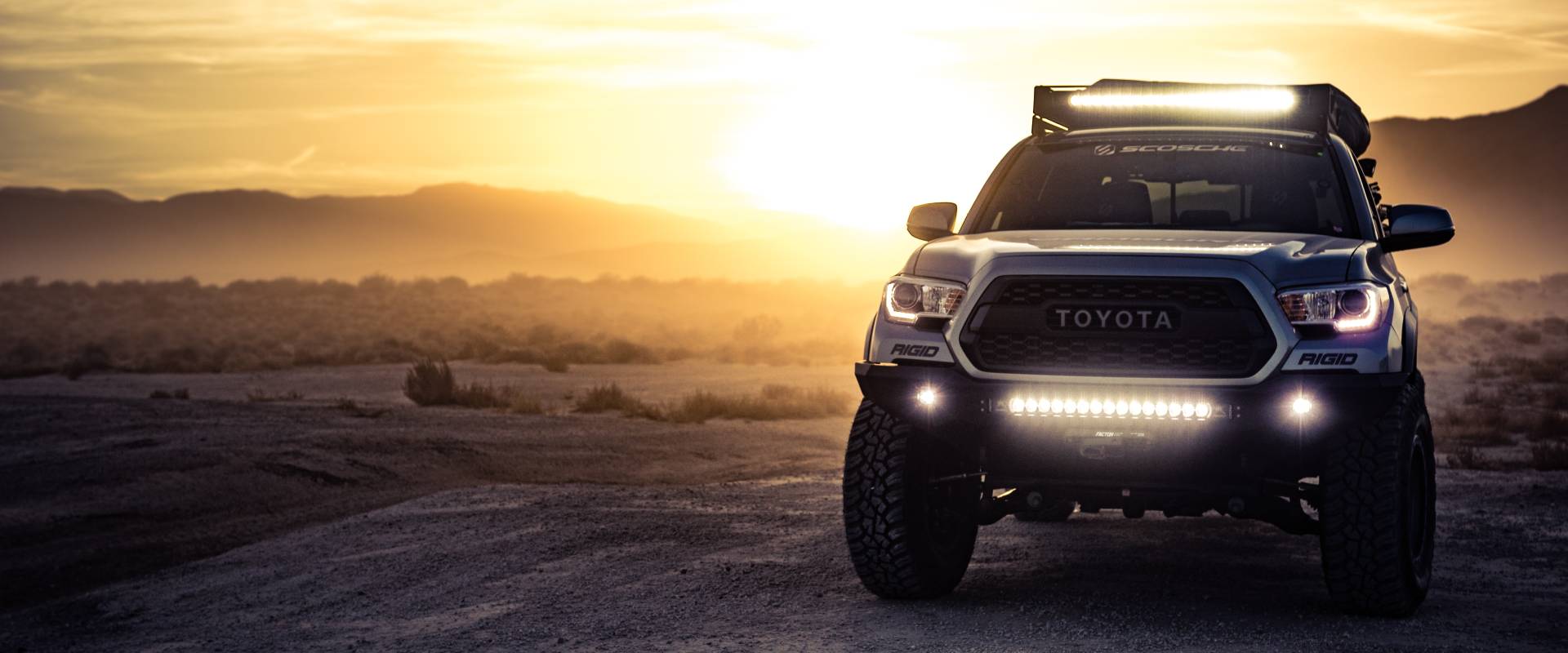 Toyota truck with off-road lights and premium all-terrain tires, highlighting the rugged performance options available at Roadstar Tire in Richmond Hill